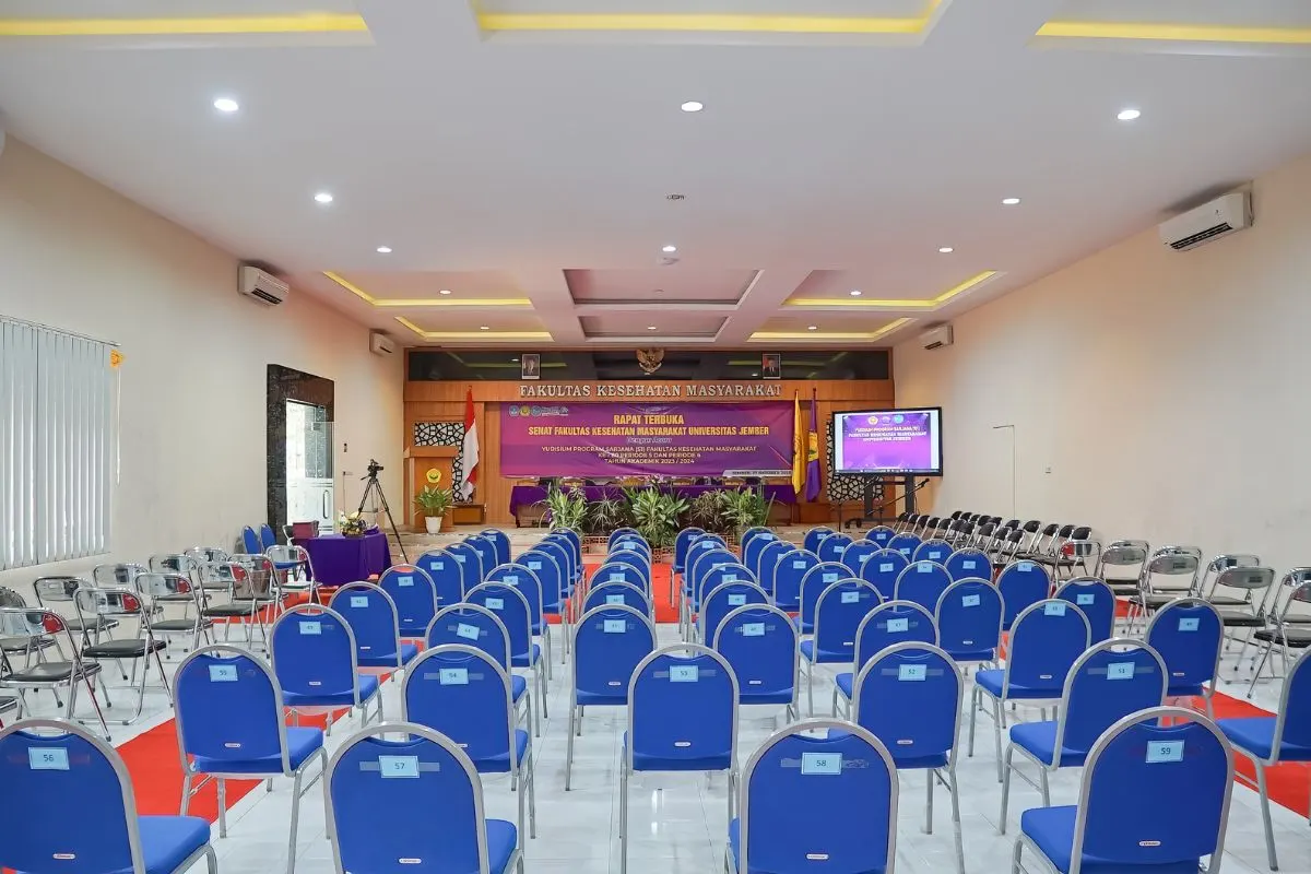 Event venue with stage setup and numbered seating ready for a successful conference